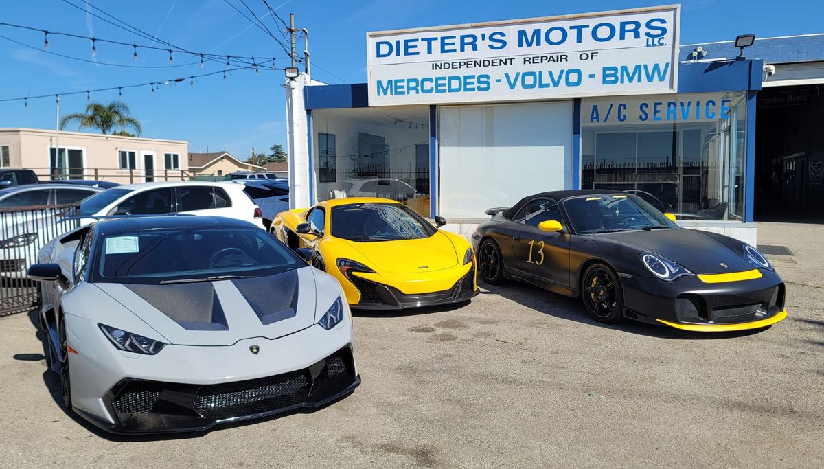Exotic and European cars parked outside Dieter's Motors auto repair shop in Oxnard, CA